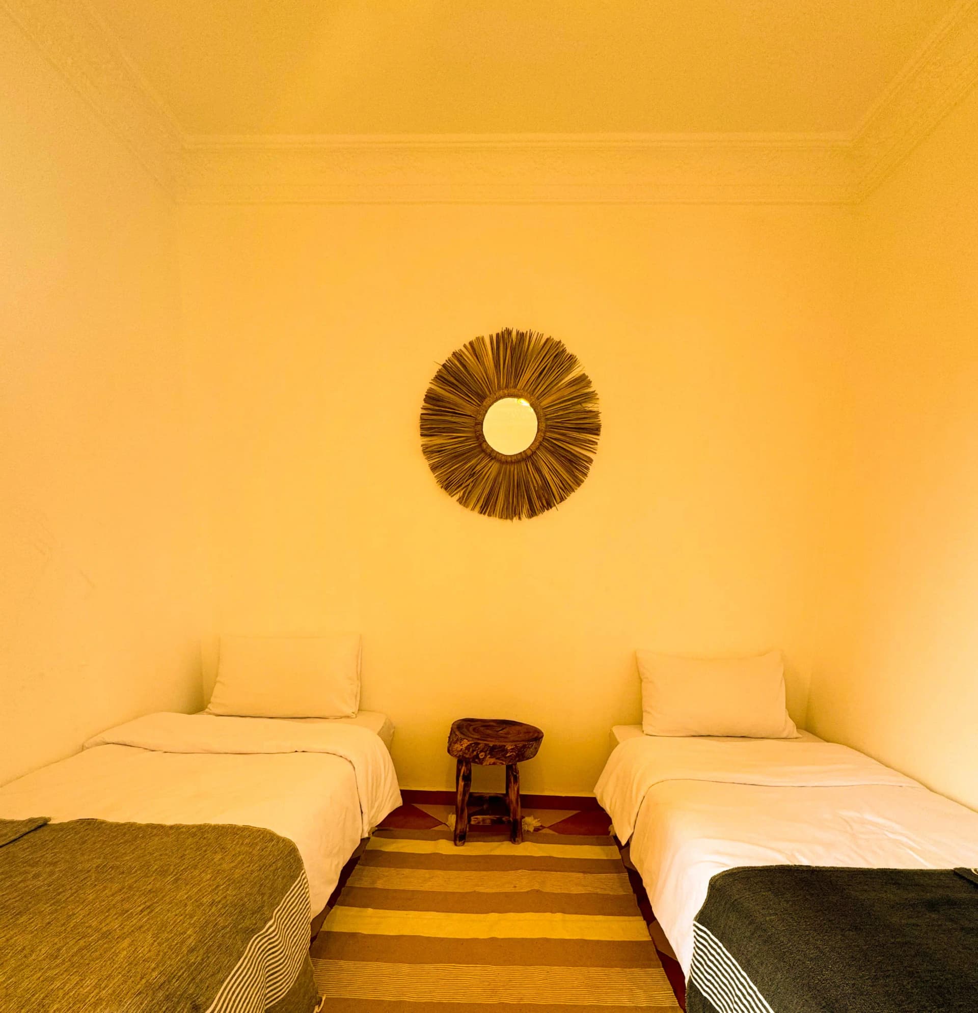 Twin beds in surf house